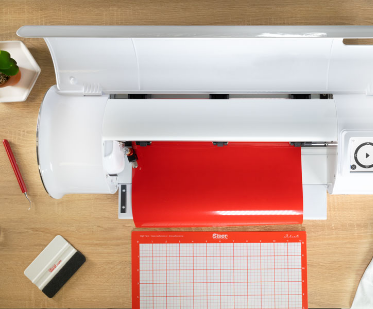 women standing in front of printer